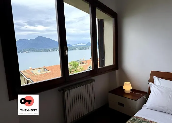 Between Greenery And The Lake, A In